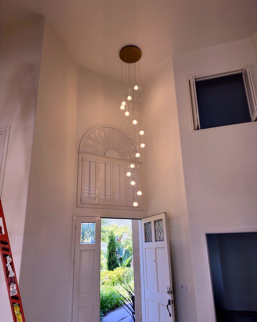 Foyer chandelier install, after
